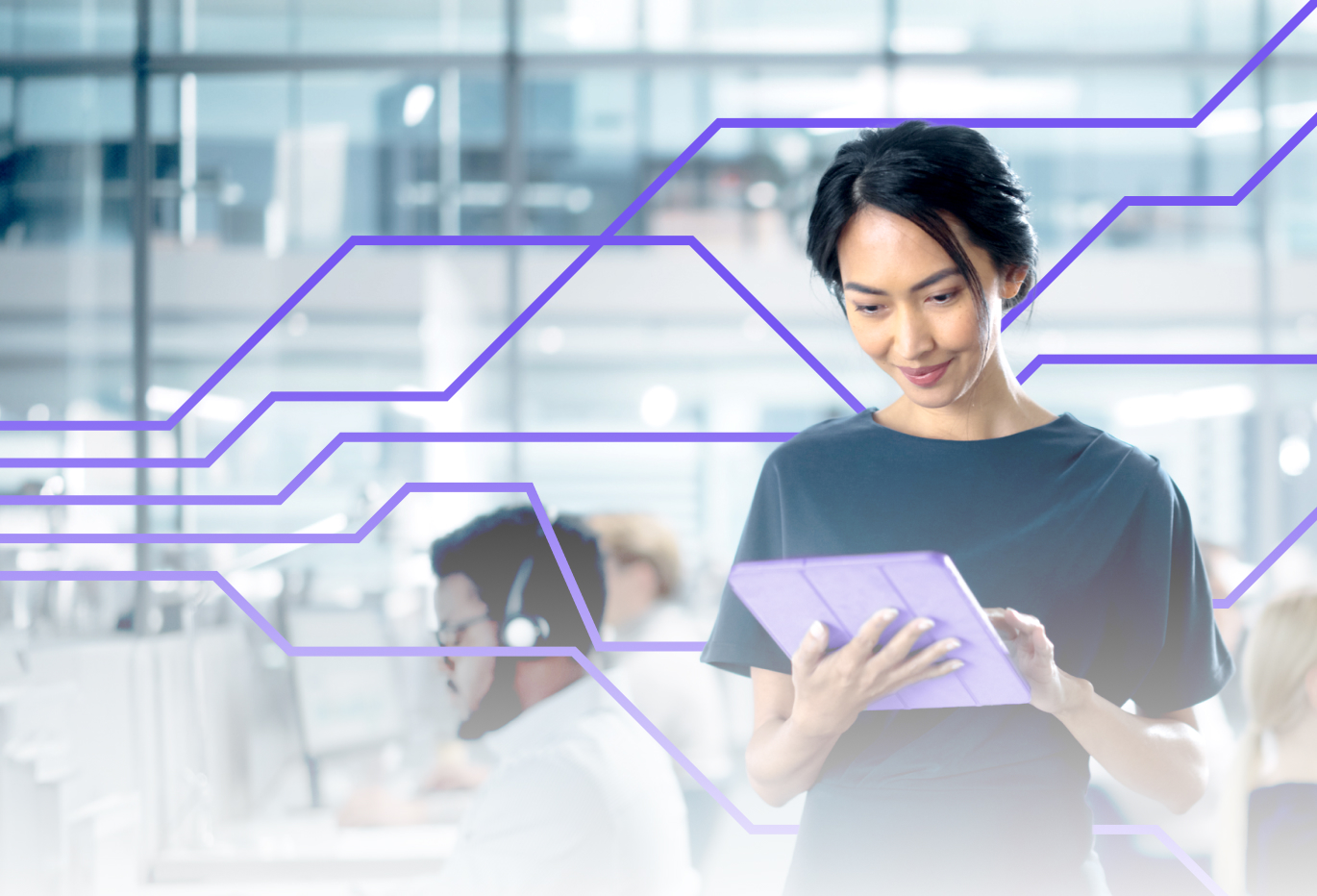 Woman working on Ipad with purple Momentum lines running through it