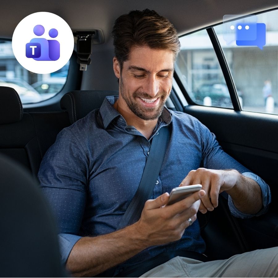 Man in a blue shirt texting from the back seat of a car, Teams and chat icons.